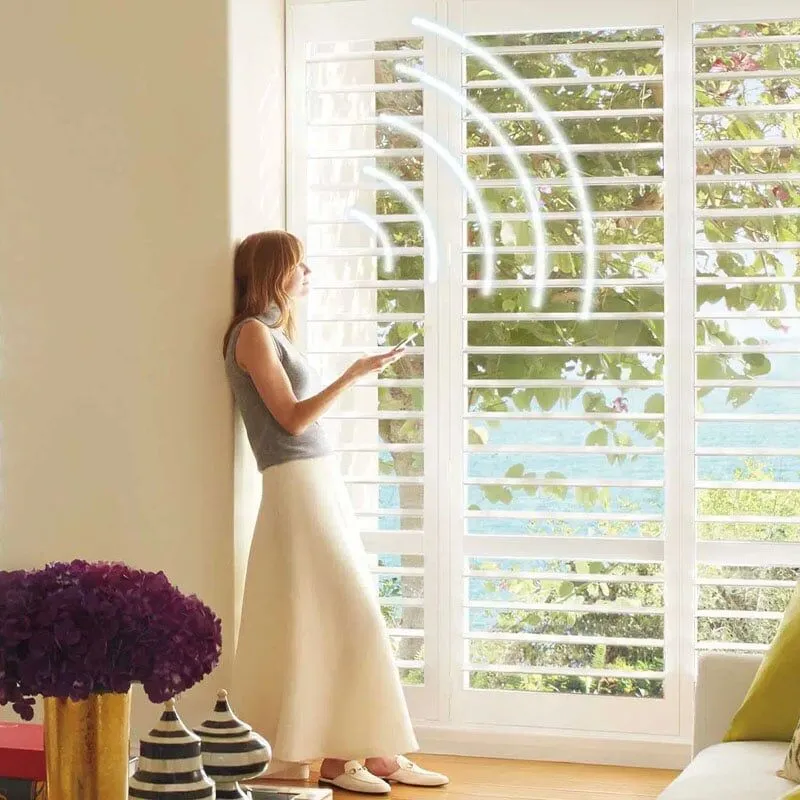 Custom smart window blinds with wireless control for light and privacy management.