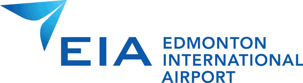 Exterior view of Edmonton International Airport showcasing modern architecture and clear signage.