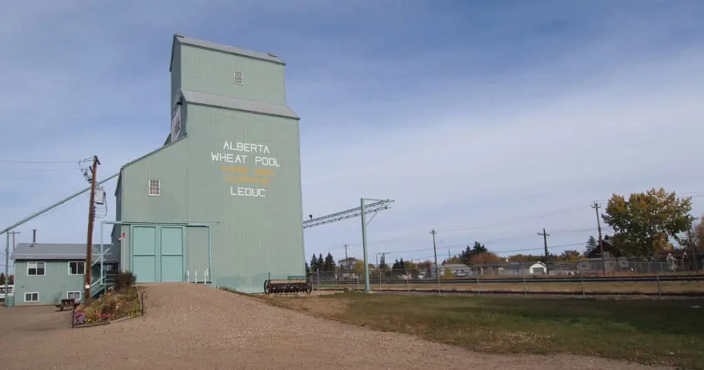 Historic Alberta Wheat Pool grain elevator in Fort Saskatchewan, AB, showcasing early 20th-century agricultural architecture.