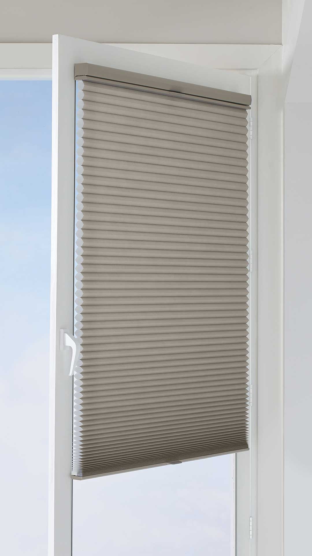 Hunter Douglas Honeycomb Shade with TrackGlide Operating System on single window