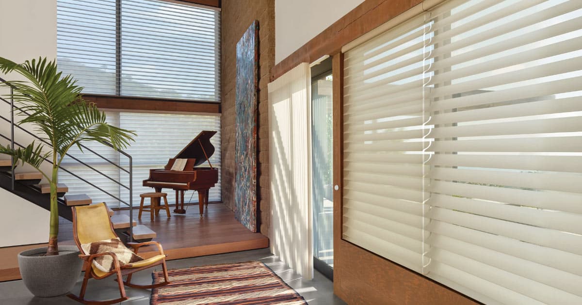 Silhouette Shades in a home with a piano