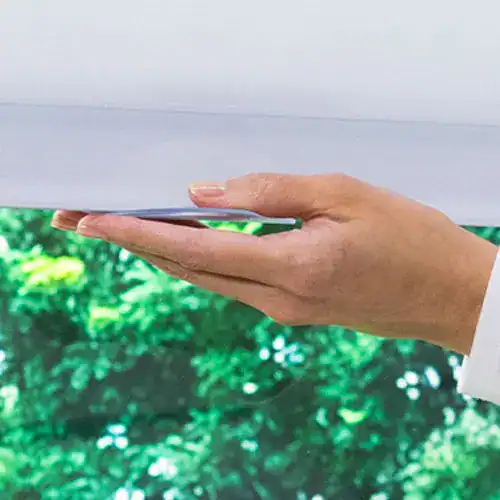Touchless sensor device detection, hands hovering over a smart device, advanced sensors, contactless control, modern technology, user interface innovation, eco-friendly gadgets, touchless interaction, smart home technology, futuristic user experiences.