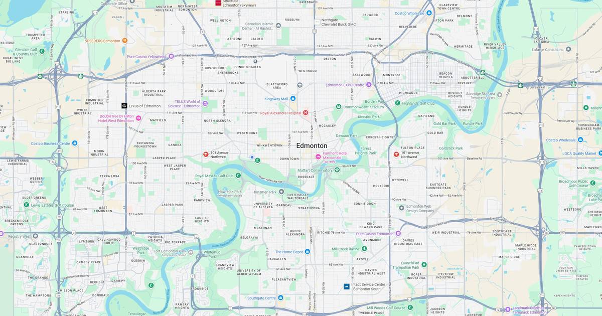 Calgary downtown city map highlighting key streets and landmarks in black, with green parks and blue waterways for visual context.