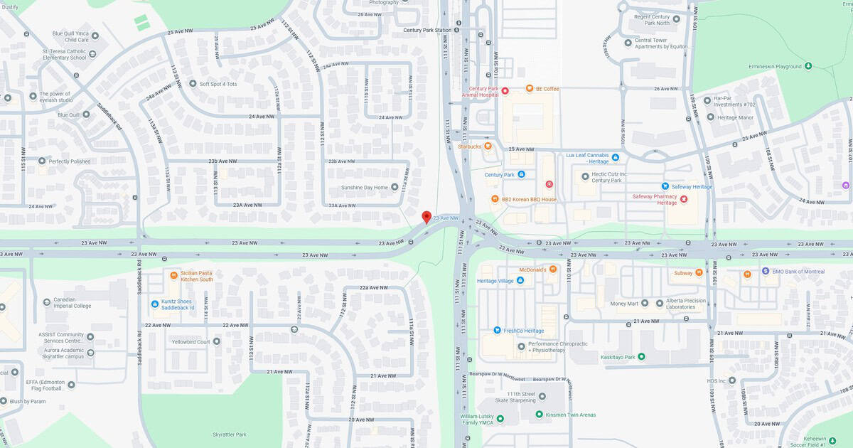 23rd Ave NW and 111th St NW intersection, showing nearby businesses, parks, and residential streets in Edmonton, Alberta.