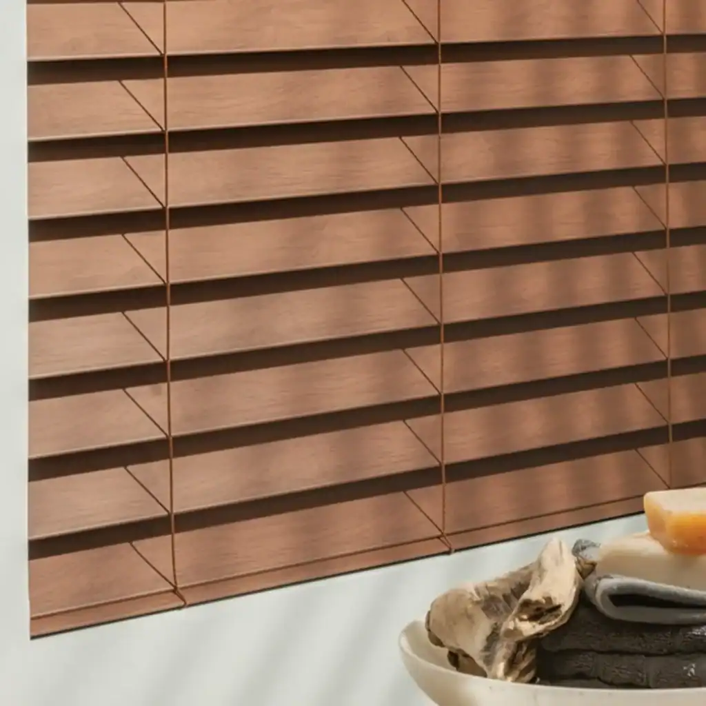 Elegant wooden window blinds with horizontal slats, providing privacy and light control in a modern interior.
