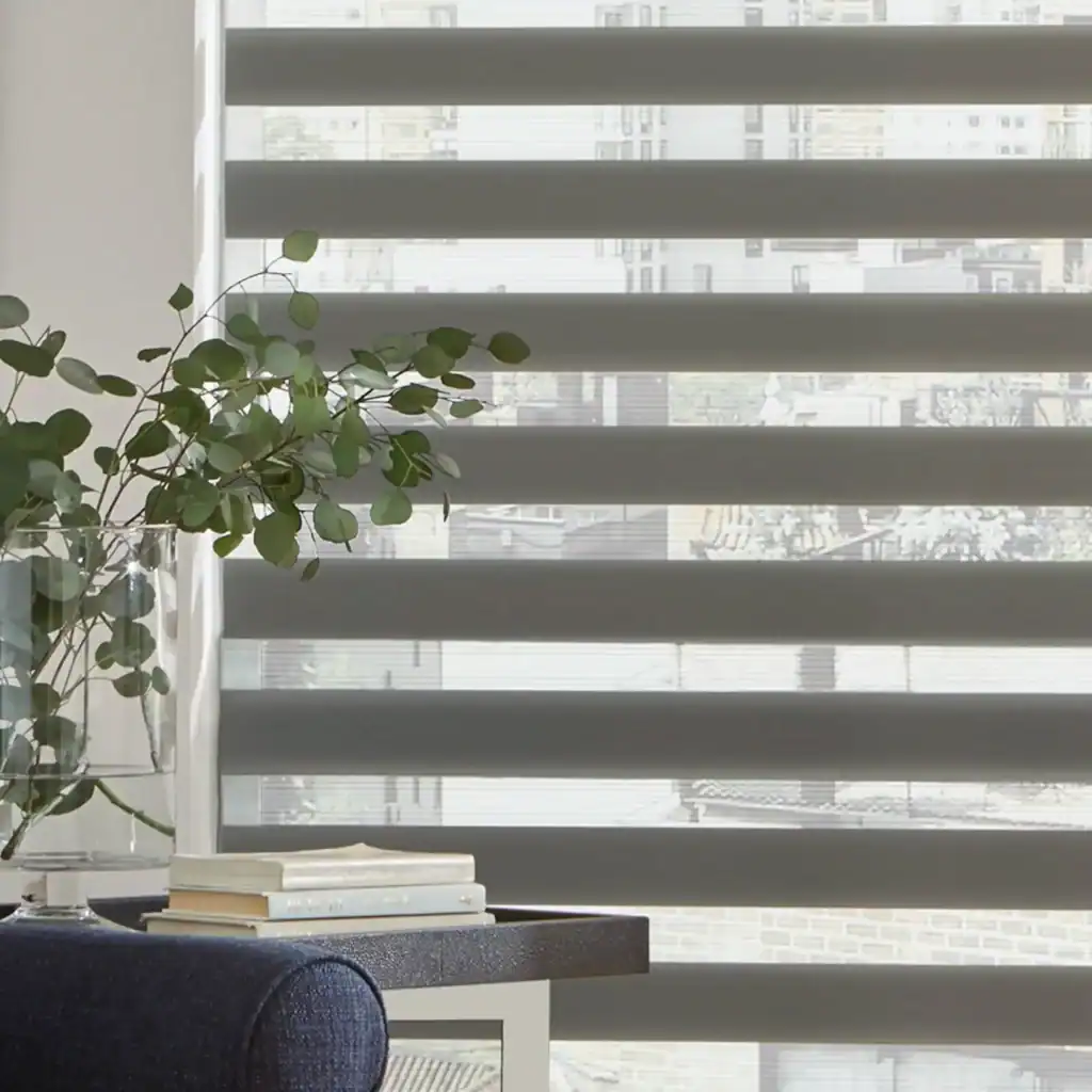 Bright window blinds with cityscape view, natural light in a contemporary interior.