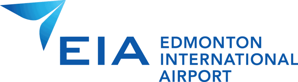 Exterior view of Edmonton International Airport showcasing modern architecture and clear signage.