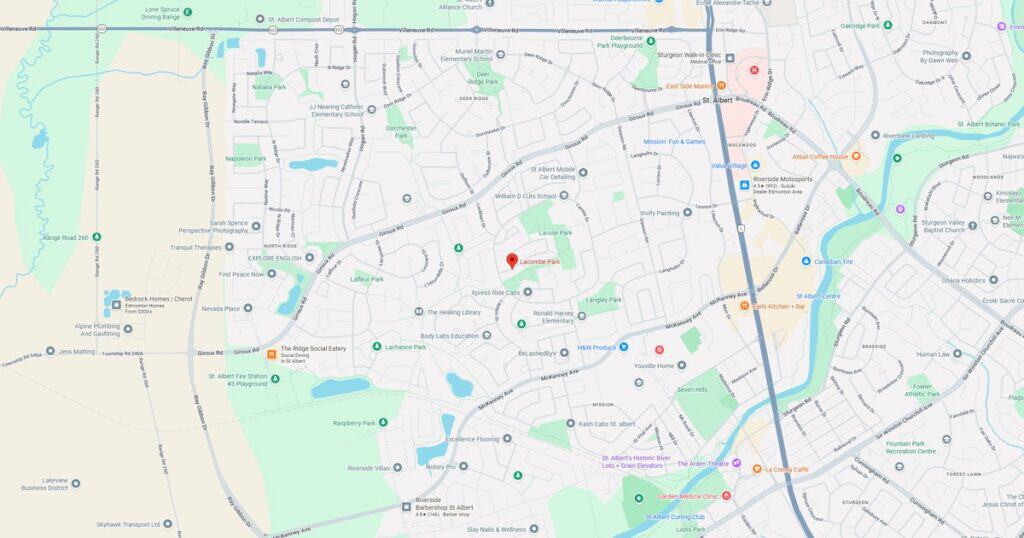 Detailed city map showing streets, parks, lakes, and landmarks with labels and icons for navigation and reference.