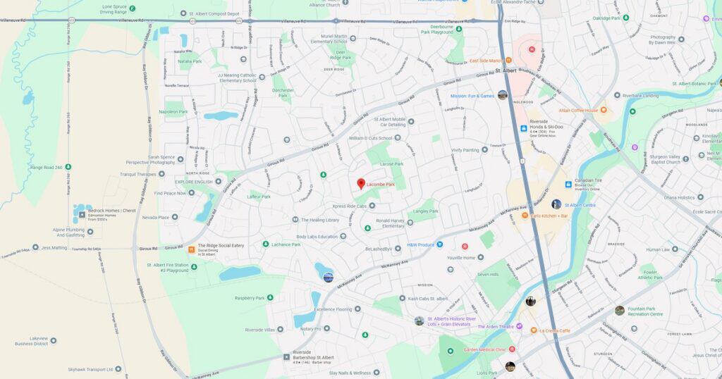 Detailed city map showing streets, parks, lakes, and landmarks with labels and icons for navigation and reference.