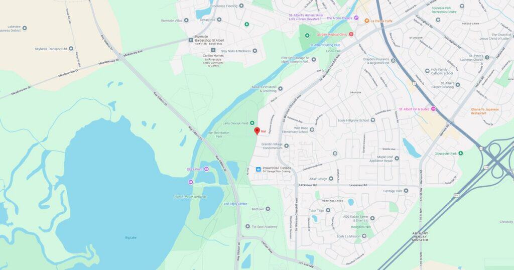Detailed map showing local park, nearby roads, water bodies, and surrounding neighborhoods in a suburban area.